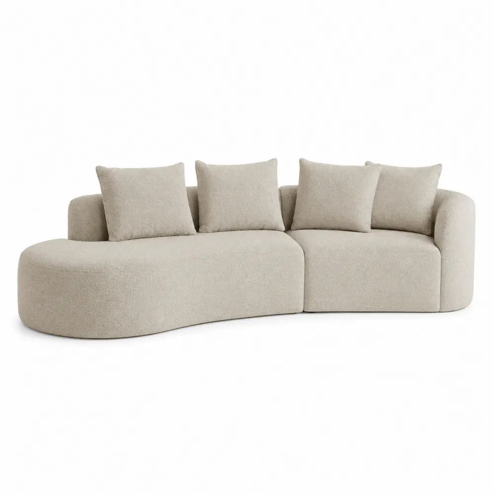 Sofá seccional en L de tela boucle beige con cojines 270x160x75cm